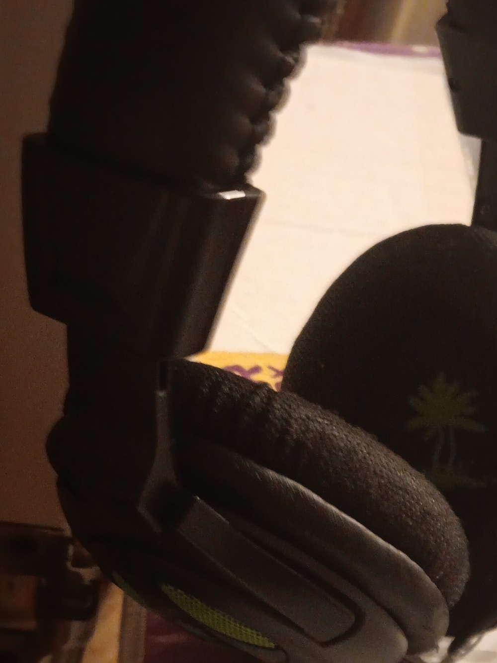 Black Over-Ear Headphones with Green Accent